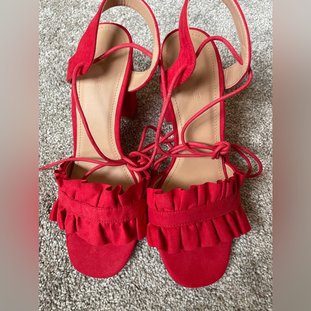 Red strappy heels